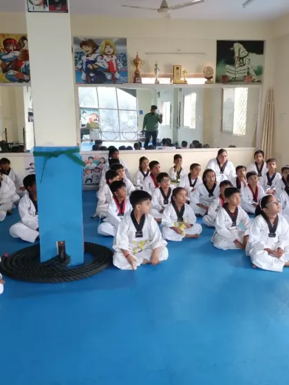 Students listen attentively to instructions before the next drill.