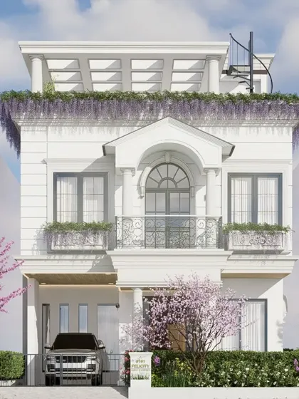 For this home on the outskirts of Bengaluru, we created a paradise for a slower pace of life. The French neoclassical inspired elevation, with its elegant arches, clean white palette, and integrated greenery, provides a sense of calm and timeless beauty amidst a developing landscape.