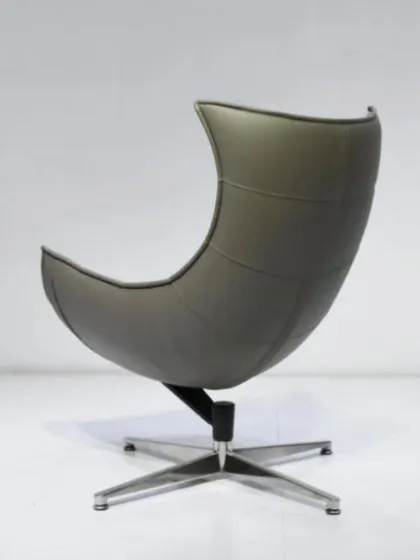 The back view of our curved lounge chair, showing how the single-form design envelops the user.