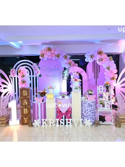 A slightly different angle of the Krishvi's butterfly party, showing the full stage.