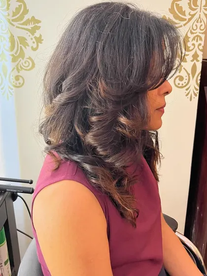 A side view showing the movement in the hair.