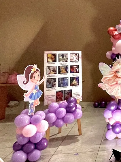 An identical image of the photo collage board and surrounding decor.