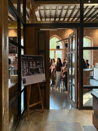 A view into our studio during the Open House event, with an exhibition panel on display.