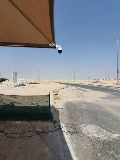 This is the same Tiandy PTZ camera in Wafra, showing how it is positioned to monitor the entrance and the street effectively.