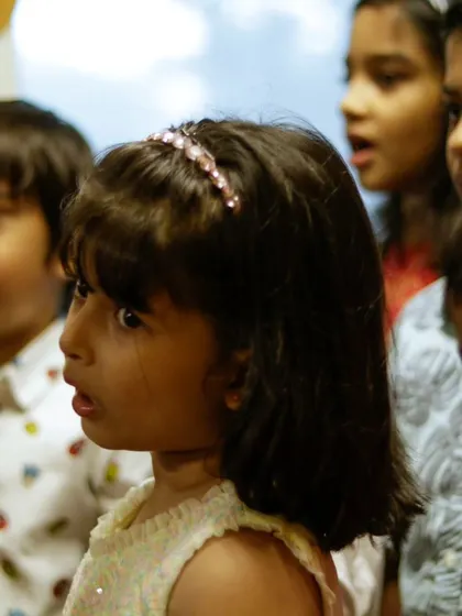 A close-up of our summer camp choir. Their expressions of awe and excitement are priceless.
