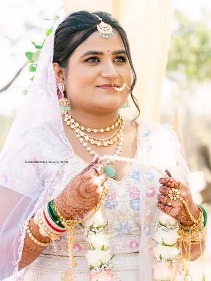 Embracing the beauty of simplicity for her wedding day. This bride chose a white lehenga, and I created a soft, natural makeup look to match the serene elegance.