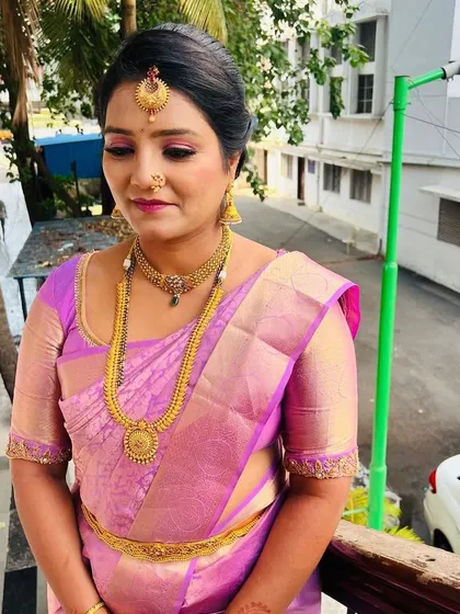 A side profile showing the subtle contouring and the soft shimmer on the eyelids. This look is perfect for someone who wants to look put-together without heavy makeup.
