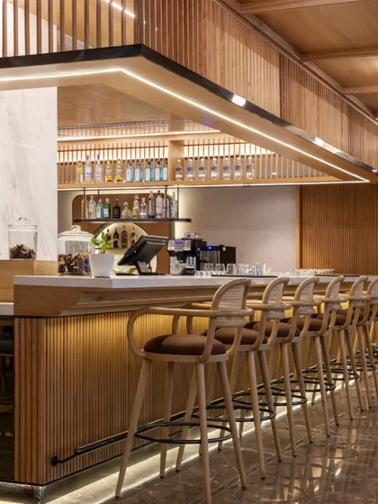 Additional views of the Radisson Resort, Khopoli, showcasing various interior and exterior details, from lobby seating areas and restaurant layouts to guest room configurations and architectural elements.