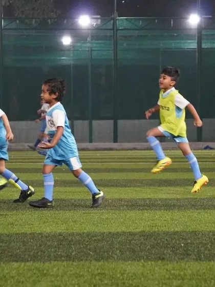 A line of our youngest players running in a warm-up drill, full of energy and excitement.