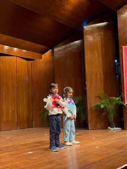 This pair showcases their creative costumes and props, designed to tell a story about feelings.