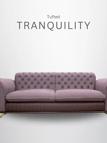 Indulge in tufted tranquility. This lounge sofa combines a classic tufted back with a rich, dual-tone color scheme and elegant metal legs, offering a sophisticated and comfortable seating experience.