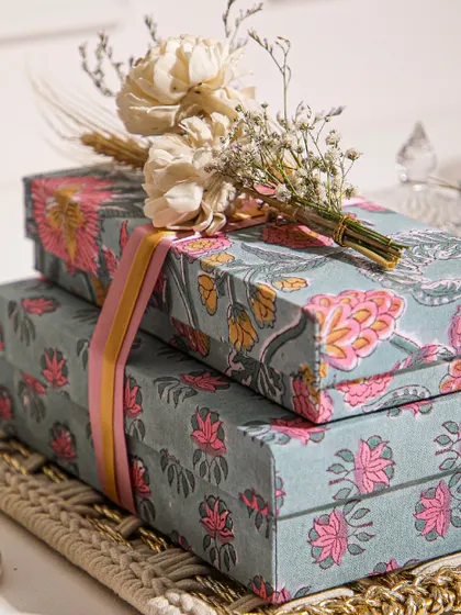The beauty is in the details. Our gift boxes are wrapped in stunning floral prints and tied with delicate ribbons and a sprig of dried flowers, making the gift special before it's even opened.
