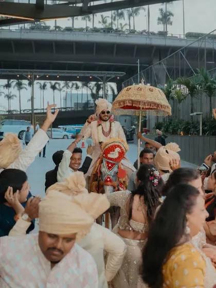 The groom's grand arrival, or baraat, is an event in itself. We coordinate every detail, from the decorated horse to the jubilant procession, making it a high-energy start to the wedding festivities.