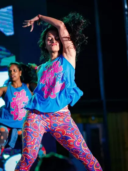 A duplicate of 166, a powerful dance pose on stage. This captures my intensity and focus as a performer, skills I use to command attention at any event.