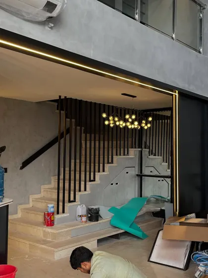 Proof that ‘under construction’ can still be cooler than your current living room. The bones of this modern staircase and living area are already looking incredible.