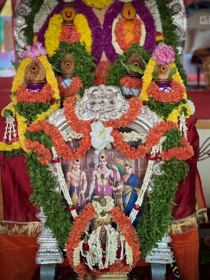 A close up of the deities for the Ram Tarak Homa, adorned with fresh flower garlands. The attention to detail in our decorations is an expression of our devotion.