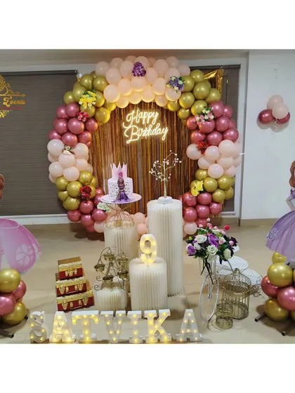 Another angle of the Sofia the First birthday decoration, showing the detailed props and character stands.