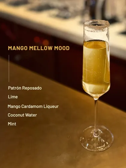 The Mango Mellow Mood, a smooth and tropical drink with mango, cardamom, and coconut water.