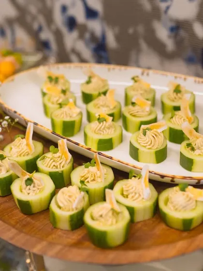 A platter of our Thecha Cucumber Cups. This innovative appetizer combines the coolness of cucumber with the spicy kick of Maharashtrian thecha.