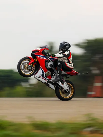Another view of the Honda CBR wheelie, a classic display of superbike stunting.