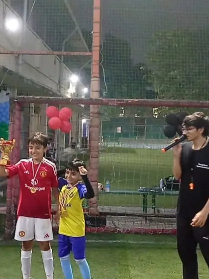 Presenting the trophy! We love celebrating the birthday boy or girl and making them feel like a true sports star.