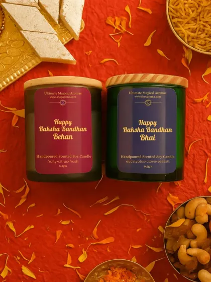 My special Raksha Bandhan collection candles, styled in a festive setting with Indian sweets. I offer candles for both 'Bhai' and 'Behan' to celebrate this beautiful bond.