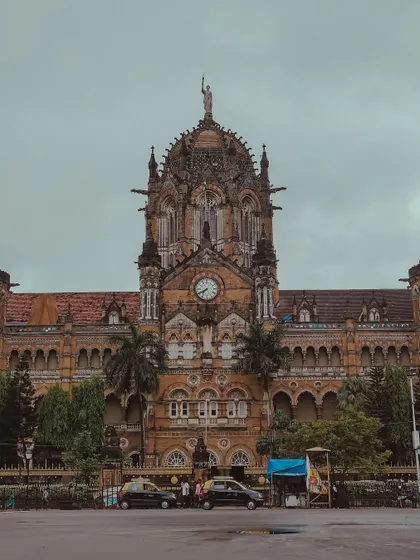 A frontal view of the Chhatrapati Shivaji Maharaj Terminus (CSMT), showcasing its incredible scale and intricate design.