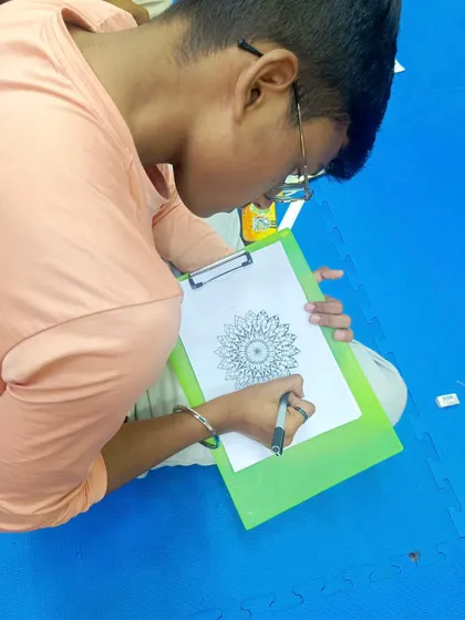 A young artist carefully drawing his patterns. I provide all the tools and guidance needed, so all you need to bring is your curiosity.