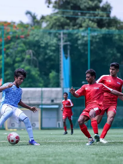 Our players battling hard against strong opposition in the state league. These high-pressure games are essential for development.