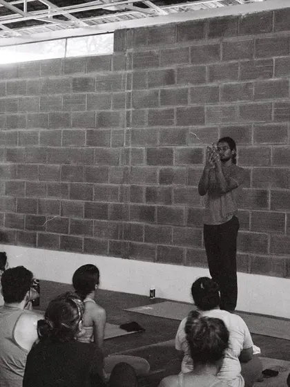 A teacher guiding the class. The journey of yoga is passed down through lineage, and I have immense gratitude for those who light the way.