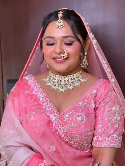 A close-up showcasing the soft, blended eyeshadow and the overall rosy glow of this bridal look. It's all about looking fresh and feeling beautiful.