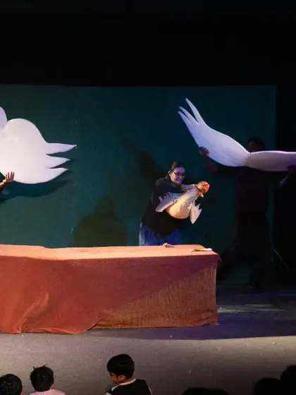 The powerful finale of 'Be Yourself', where the ugly duckling transforms and takes flight. We use simple, elegant cutouts to represent the swan's wings, creating a moment of pure theatrical magic.