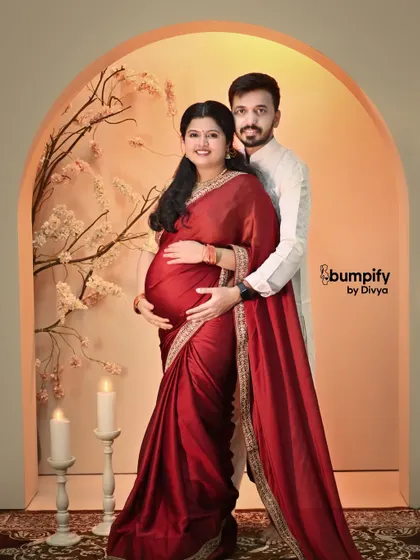 A traditional saree brings such elegance and grace to a maternity portrait. This studio session combines classic attire with a soft, warm backdrop for a timeless and culturally rich memory.