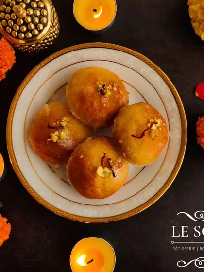 For Diwali, I created these Baadusha-inspired doughnuts. I use my soft doughnut dough to create a modern take on the traditional Indian sweet, soaked in a fragrant syrup.