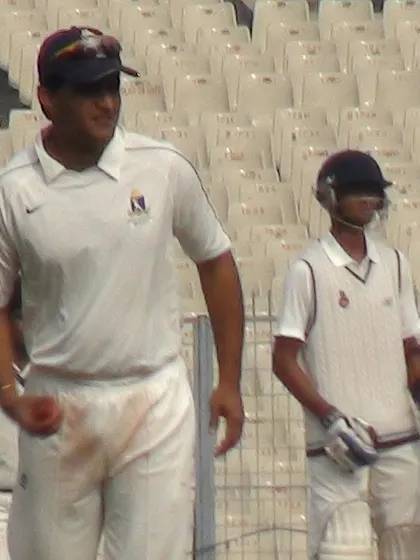 A memory from my professional career during the 2011-12 Ranji Trophy season. Here I am on the field at Eden Gardens during a Delhi vs Bengal match with the legendary Sourav Ganguly. This experience at the highest level of domestic cricket shapes the professional standards I bring to my coaching.
