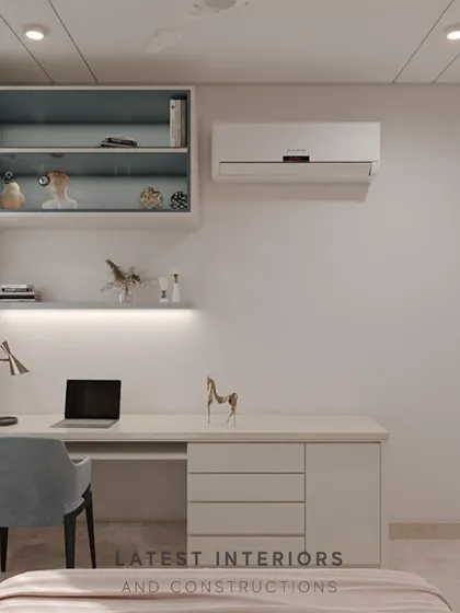 A well-organized study corner integrated into the bedroom. The sleek desk and open shelving provide a functional workspace without compromising on style.