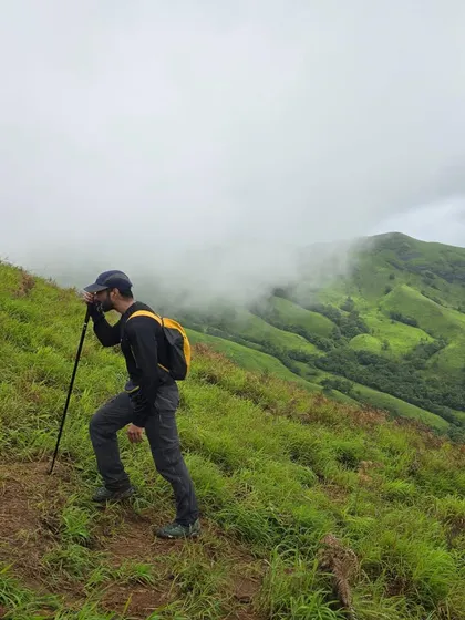 Making my way up the misty slopes. Trekking is a great test of endurance and leg strength.