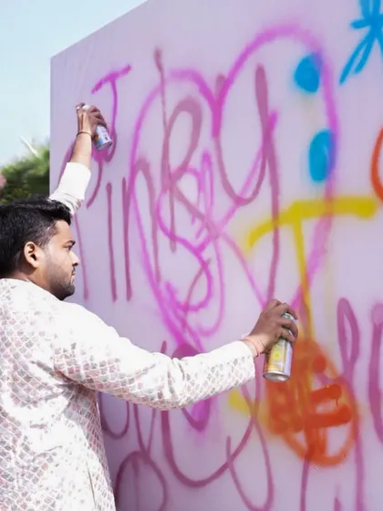 An interactive graffiti wall where guests could spray-paint their own messages, adding a fun, personal element to the event.