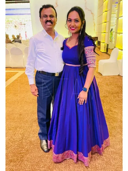 My loyal client Jeevitha looks stunning in this royal blue Anarkali gown. The design features contrasting embroidered sleeve cuffs and a traditional border at the hem.