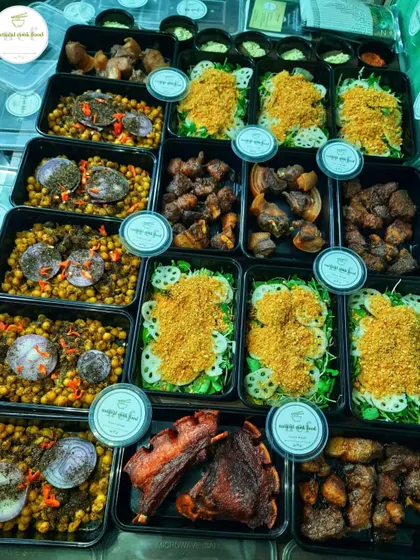 The full spread of the order going to the Maldives, including snacks and pork dishes.