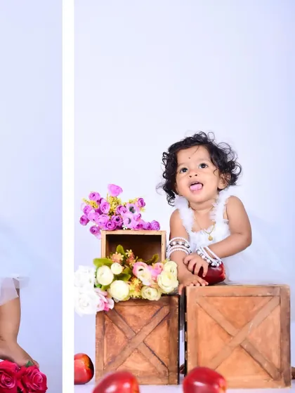 A collage of a baby girl in a white dress with apples and flowers.
