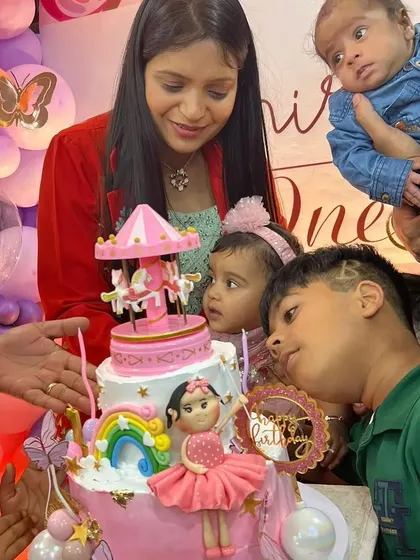 A client photo from a first birthday party. Seeing the kids' eyes light up when they see the cake is one of the best parts of my job.