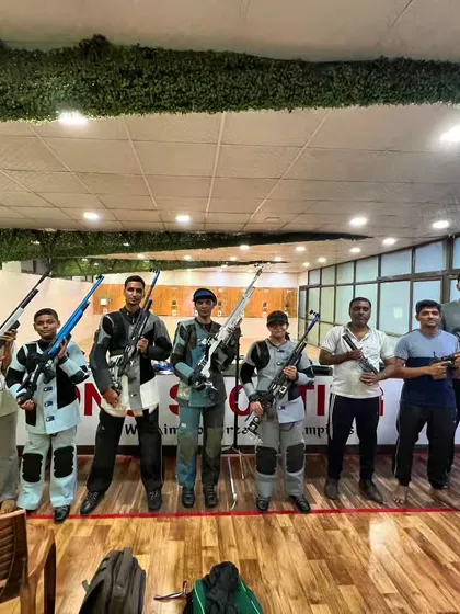 A group of our dedicated shooters, from beginners to those in full competition gear, ready for a day of training. This is what a community of champions looks like.