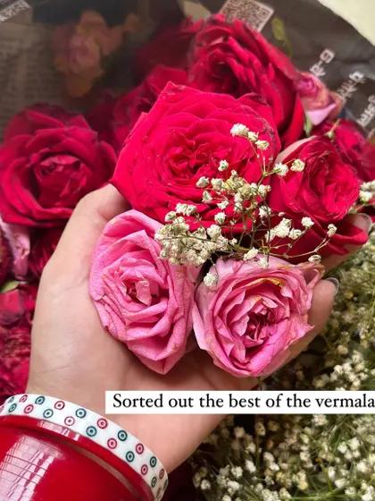 After receiving the fresh varmala, I carefully sort out the best of the flowers to be used in the final piece. Quality is key.