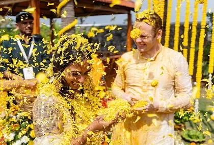 This is the pure, unscripted joy of a phoolon ki holi. I love creating these moments where you can let go and just celebrate. It’s a beautiful, fragrant, and photogenic alternative to a traditional haldi ceremony.