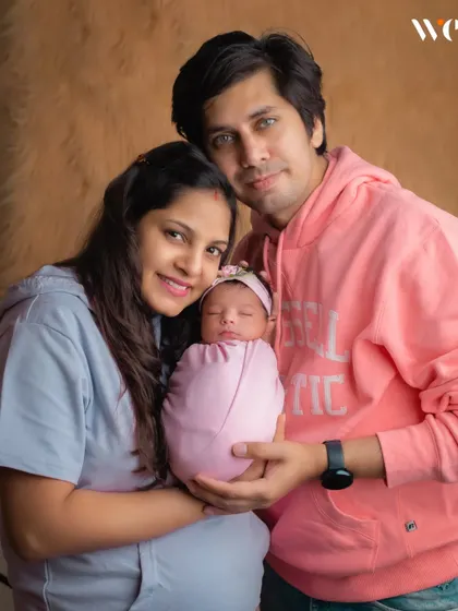 The first family portrait is a priceless memory. We always make time during our newborn sessions to capture the new parents holding their baby, marking the beginning of a new chapter.