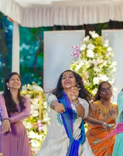 The pure joy of dancing with friends at a sangeet. This photo captures the vibrant energy and happiness that we strive to create at every event we choreograph.