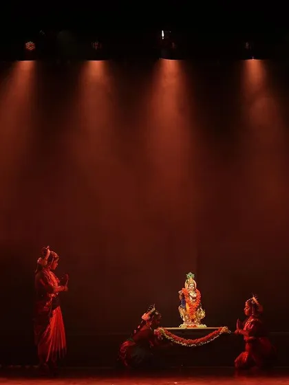 A scene of devotion from "Nrithya Milanam 2023", where dancers pay homage to a Ganesha idol. Our performances are always rooted in Bhakti and reverence.