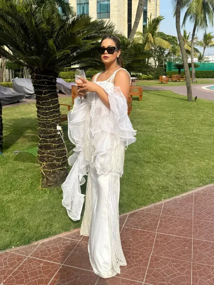 Ethnic wear and sunglasses are a power combination. A look from a wedding event in Kolkata.