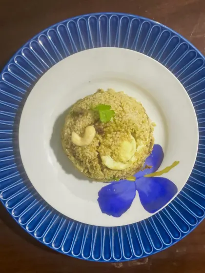 A healthy twist on a classic: my Millet Chicken Biryani. Cooked like a traditional Malabar pulao, this dish uses nutritious millet instead of rice, infused with delicate spices and served with boiled eggs. It's light yet incredibly flavorful.